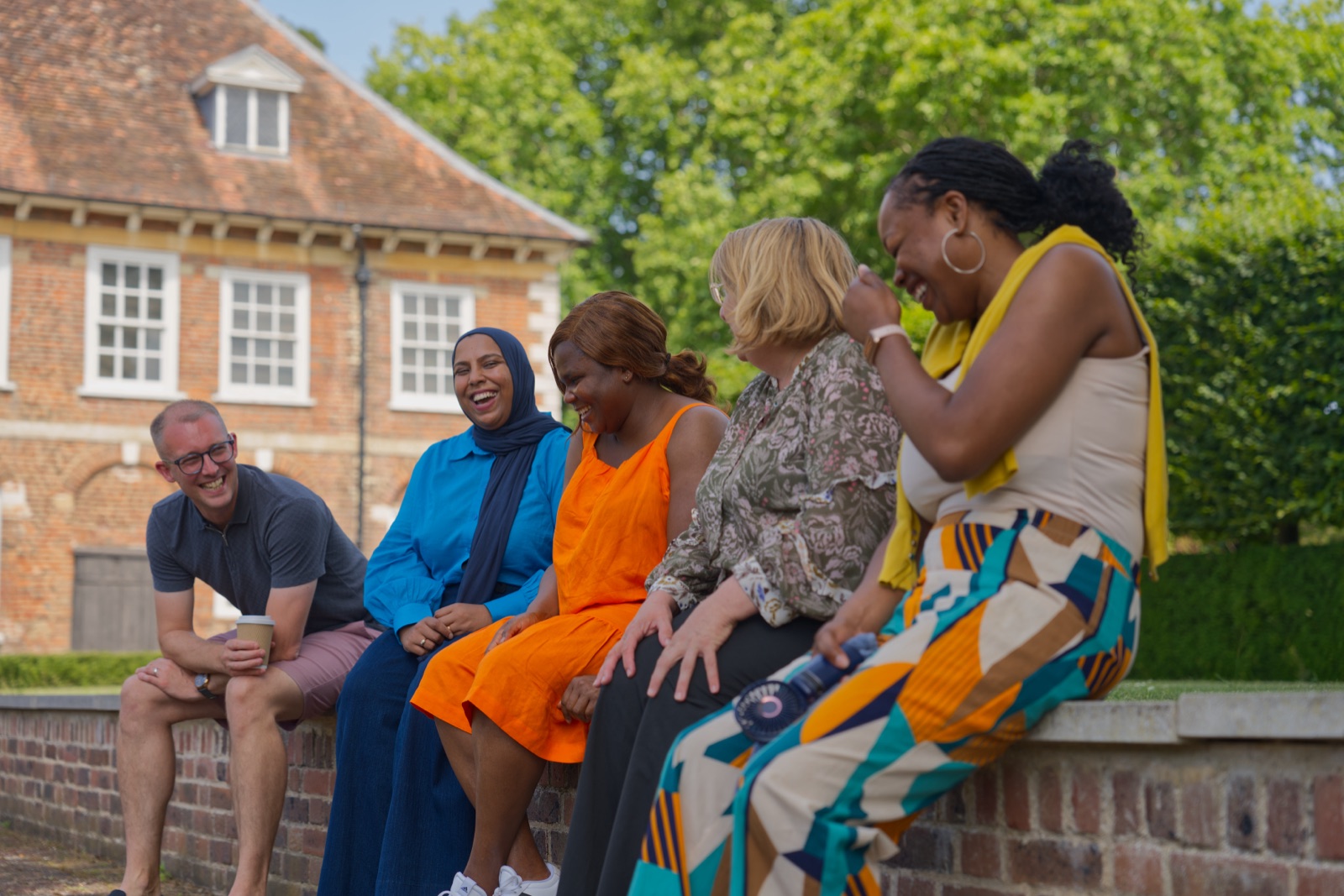 Leaders connecting outside during a FirstHuman programme